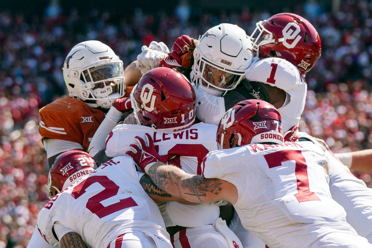 The Oklahoma defense stops Texas running back Jonathon Brooks in his tracks during a goal-line stand in the fourth quarter of the Sooners' 34-30 victory Oct. 7. That stand summed up the Longhorns' red-zone issues, which coach Steve Sarkisian says are a top priority in the second half of the season.