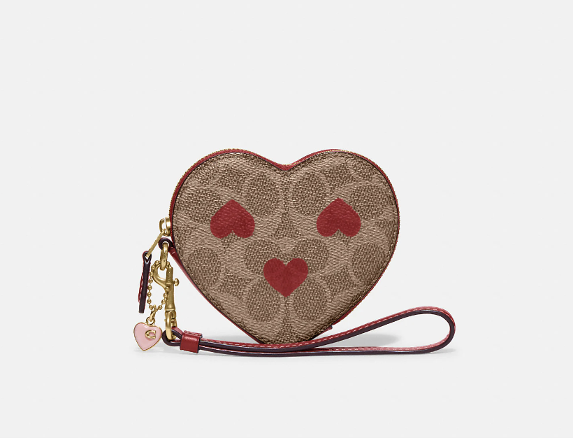 Heart Wristlet in signature canvas with heart print (Photo via Coach)