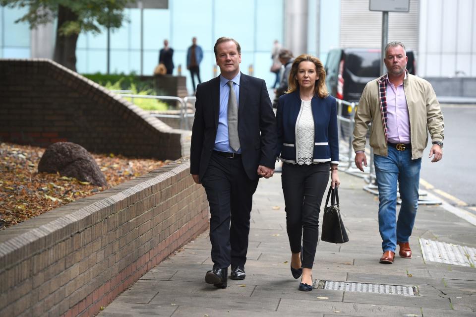 Conservative MP for Dover Charlie Elphicke, with his wife Natalie Ross, leaving Southwark Crown Court in London (PA)