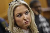 Roxanne Adams, a member of the legal team defending Oscar Pistorius, is seen during the second day of the trial of the Olympic and Paralympic track star at the North Gauteng High Court in Pretoria March 4, 2014. REUTERS/Kim Ludbrool/Pool (SOUTH AFRICA - Tags: SPORT ATHLETICS CRIME LAW HEADSHOT)