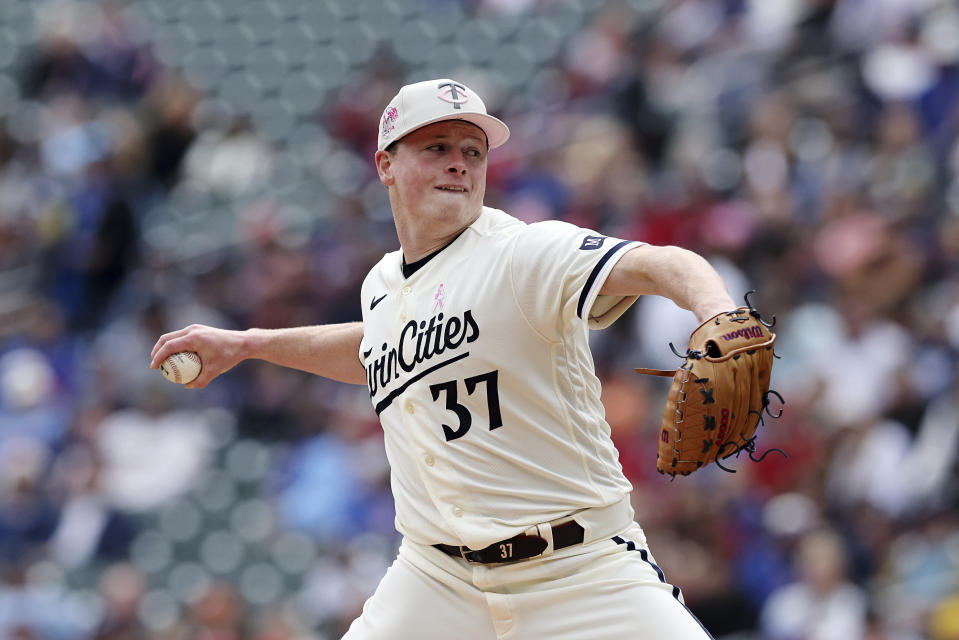 CORRECTS DATE TO MAY 14 INSTEAD OF MAY 15 - Minnesota Twins starting pitcher Louie Varland (37) throws during the first inning of a baseball game against the Chicago Cubs, Sunday, May 14, 2023, in Minneapolis. (AP Photo/Stacy Bengs)