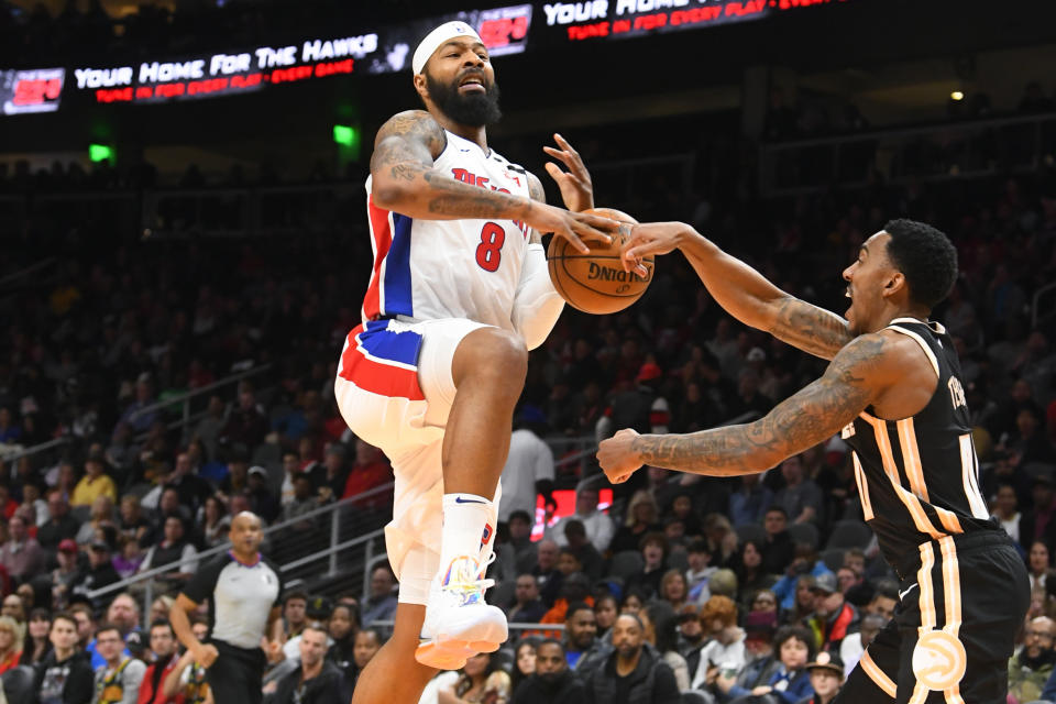 Detroit Pistons forward Markieff Morris (8) has the ball stripped from him by Atlanta Hawks guard Jeff Teague during the second half of an NBA basketball game Saturday, Jan. 18, 2020, in Atlanta. (AP Photo/John Amis)