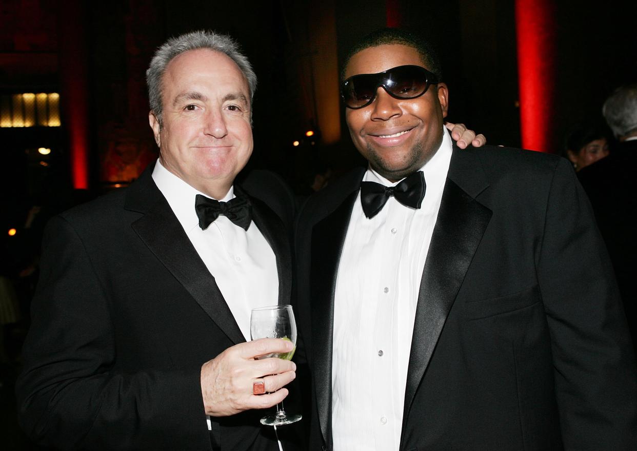 Lorne Michaels and Saturday Night Live cast member Kenan Thompson in black suit