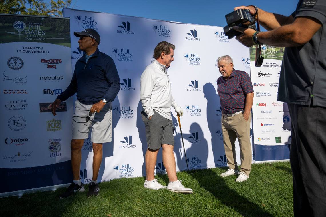 Former MLB player Steve Garvey, center, talks with real estate developer and Kings minority owner Phil Oates, right, during the Phil Oates Phil Oates Celebrity Golf Classic at North Ridge Country Club in Fair Oaks on Monday. Ronnie Lott, a Hall of Fame safety for the San Francisco 49ers, stands at left.