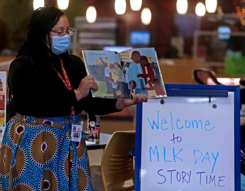 Khorye Huffman, librarian at the Waukesha Public Library, 321 Wisconsin Ave., Waukesah, reads “We March” by Shane W. Evans on Monday, Jan. 17, 2022, during the children’s storytime as part of the Martin Luther King Jr. celebration at the library. The public was also invited to contribute to a collaborative art journal to share their thoughts and feelings about the holiday and other social issues.