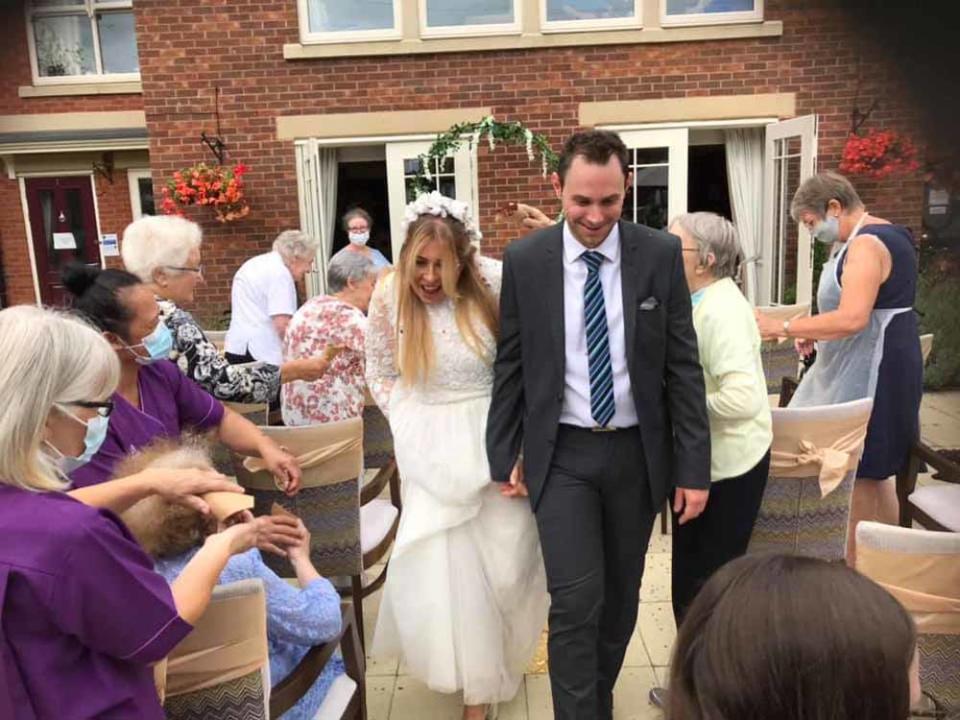 Katie and Phil had a blessing in the back garden of the care home followed be a delicious buffet (Collect/PA Real Life).