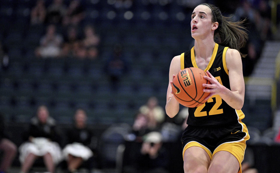 Caitlin Clark fires one up from the three point line during the final game of the NCAA college basketball Gulf Coast Showcase, Sunday, Nov. 26, 2023, in Estero, Fla. (AP Photo/Chris Tilley)