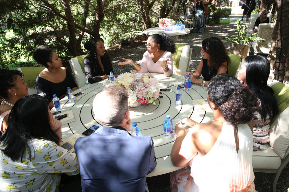 Oprah speaks with reporters at a special roundtable in a private garden at her home.&nbsp;