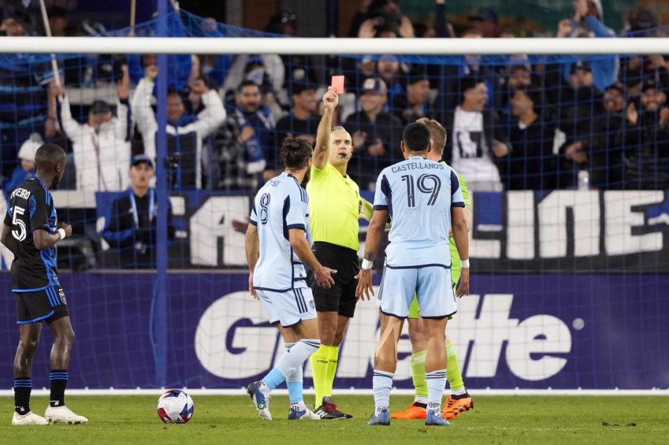 Sporting Kansas City defender Robert Castellanos (19) receives a red card from referee Tim Ford during the first half against the San Jose Earthquakes at PayPal Park on April 15, 2023.