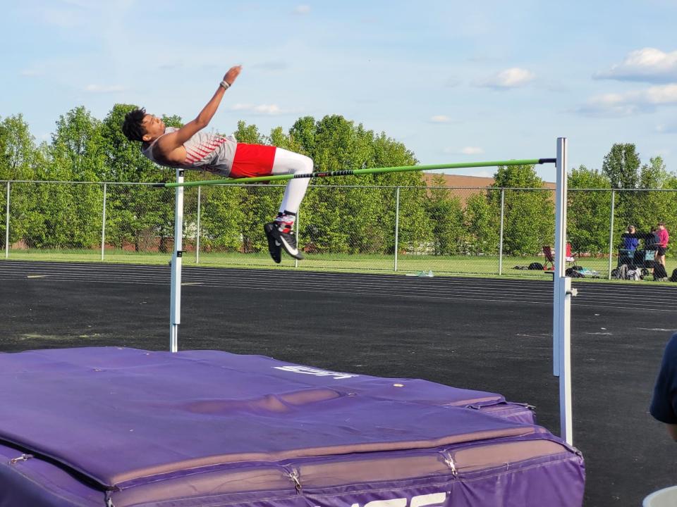 Canton South's Xavier Williams competes in the high jump at the Jackson Polar Bear relays.