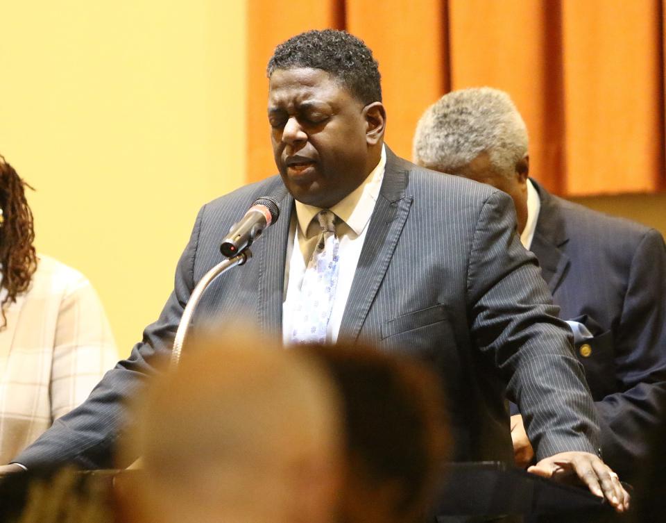 Pastor Aaron Hill Sr. gives the invocation Sunday, Jan. 15, 2023, during the Martin Luther King Jr. celebration at Second Baptist Church in Alliance.