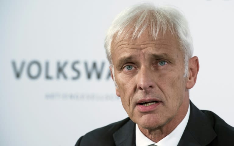 Volkswagen's new chief executive, Matthias Mueller, says four employees have been suspended in the company's emissions scandal