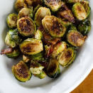 <p>For a not-so-boring veggie, toss some 'sprouts in coconut aminos, honey, and whole grain mustard. They may just be <a rel="nofollow noopener" href="http://www.redbookmag.com/food-recipes/recipes/g988/thanksgiving-recipes/" target="_blank" data-ylk="slk:the best thing on the table;elm:context_link;itc:0;sec:content-canvas" class="link ">the best thing on the table</a> this year.</p><p><strong>Get the recipe at <a rel="nofollow noopener" href="http://cookeatpaleo.com/bacon-roasted-brussels-sprouts-with-honey-mustard/" target="_blank" data-ylk="slk:Cook Eat Paleo;elm:context_link;itc:0;sec:content-canvas" class="link ">Cook Eat Paleo</a>.</strong></p>