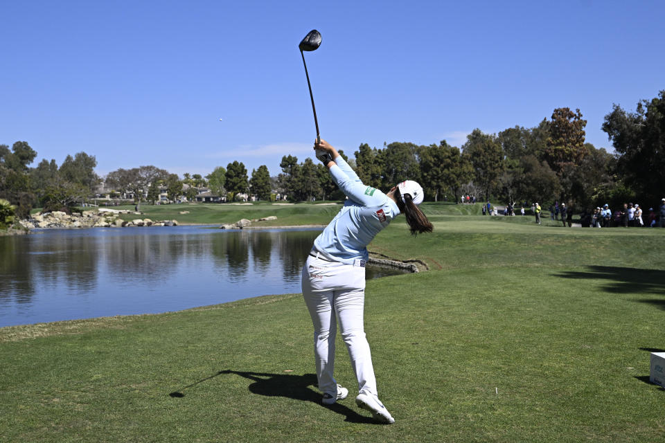 Choi Hye-jin, of South Korea, hits her tee shot on the 10th hole during the third round of the JTBC LPGA golf tournament, Saturday, March 26, 2022, in Carlsbad, Calif. (AP Photo/Denis Poroy)