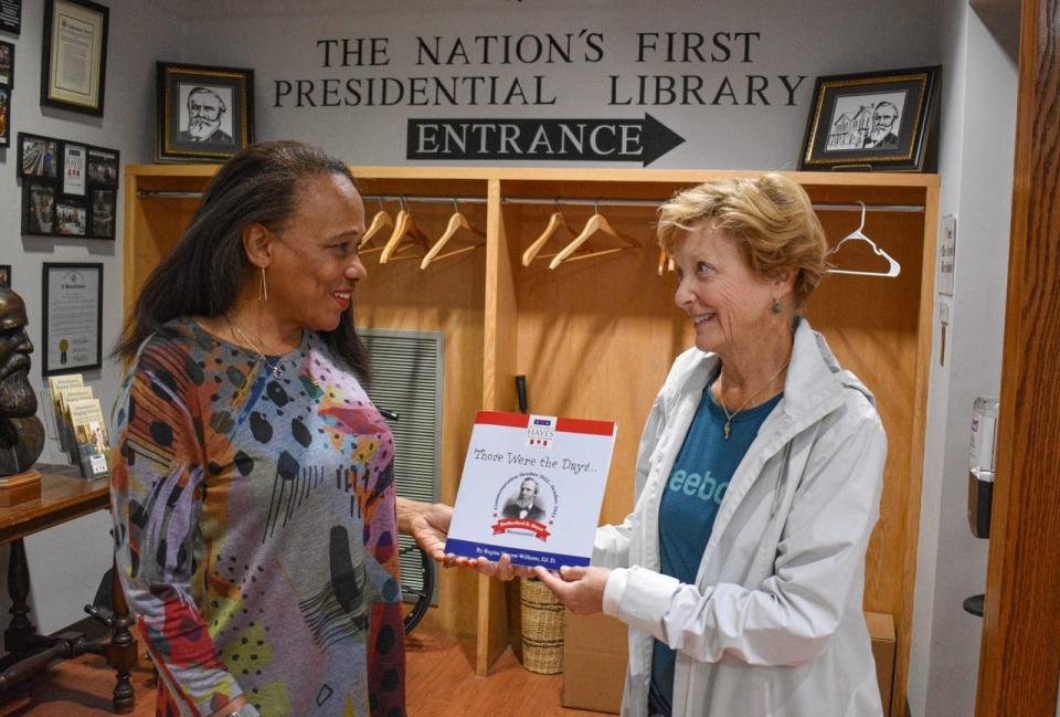 Mary Kay Farrell of Fremont, right, was surprised to meet Dr. Regina Vincent-Williams, the author of “Those Were the Days,” when she purchased a copy of the book for her grandchildren at the Hayes Presidential Museum Store. The serendipitous timing gave Farrell the opportunity to have the book signed.