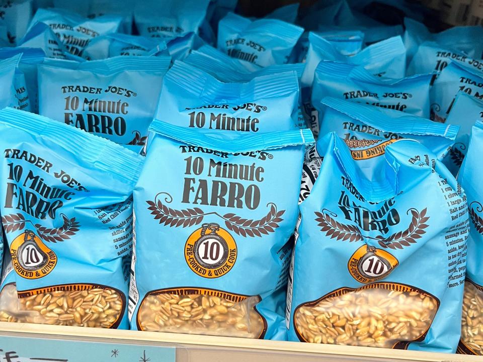 Bags of Trader Joe's 10-minute Farro on display, with a price tag that reads $1.99.