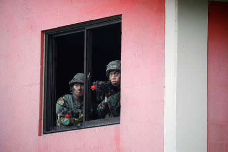 South Korean soldiers take part in a combined arms collective training exercise in Pocheon, South Korea September 19, 2017. REUTERS/Kim Hong-Ji