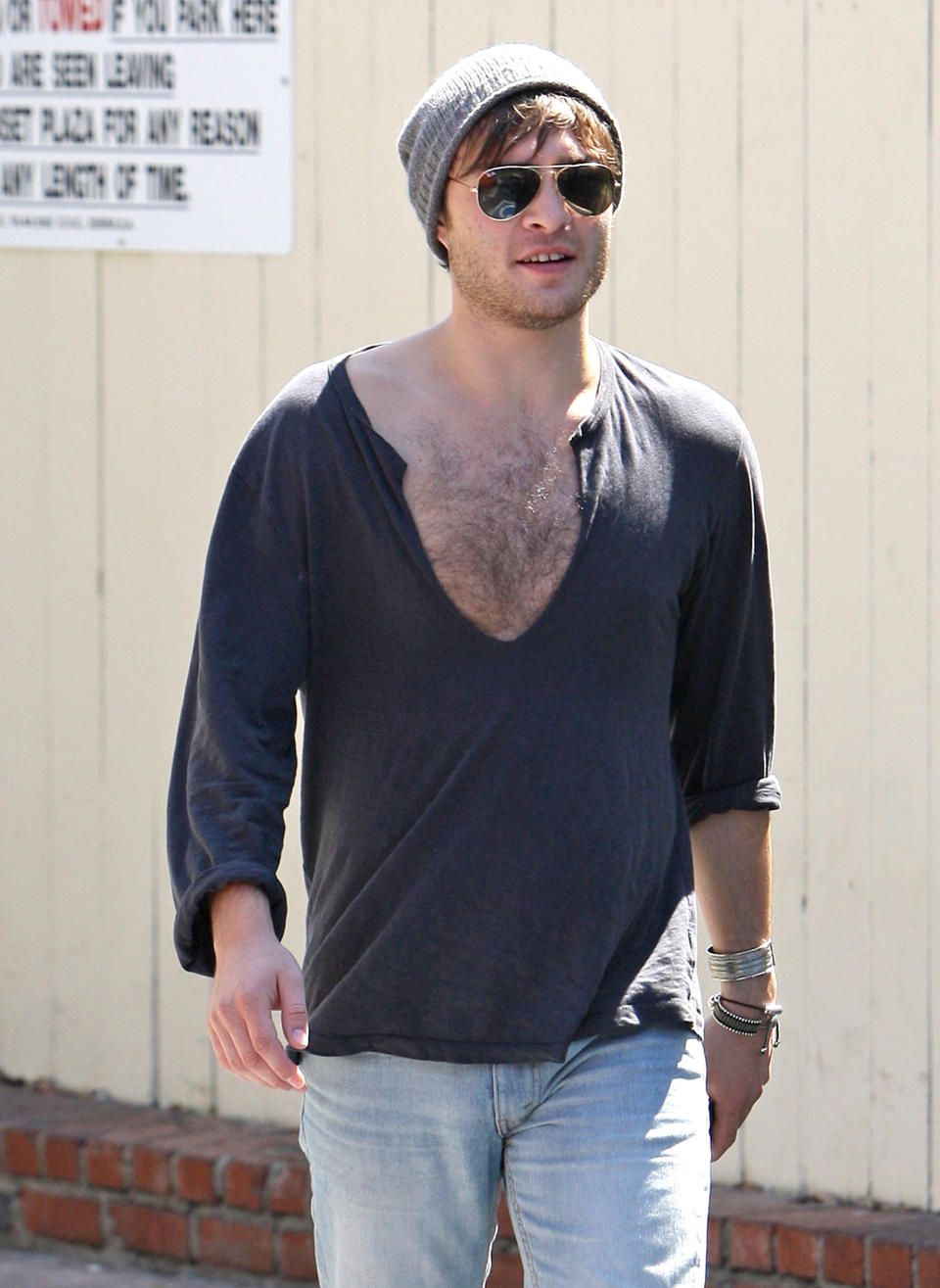 Ed Westwick shows his stubble cleavage