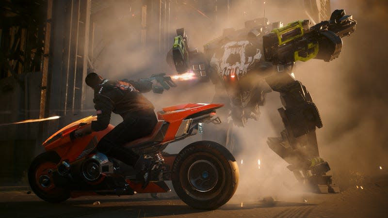 V is seen shooting a robot on their motorcycle.