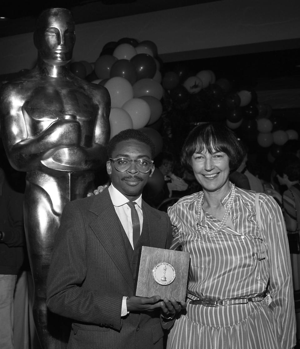 This undated publicity photo provided by the Motion Picture Academy of Arts and Sciences shows Spike Lee, left, winner, Dramatic Merit Award for "Joe's Bed-Stuy Barbershop: We Cut Heads," and Academy president Fay Kanin at the 1983 (10th) Student Academy Awards ceremony in Beverly Hills, Calif. The latest group of Student Academy Award winners will be celebrated at a ceremony at the Motion Picture Academy of Arts and Sciences in Los Angeles on June 8, 2013. (AP Photos/AMPAS, Long Photography)