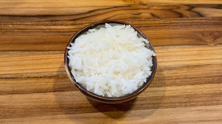 Rice stuffed into small bowl