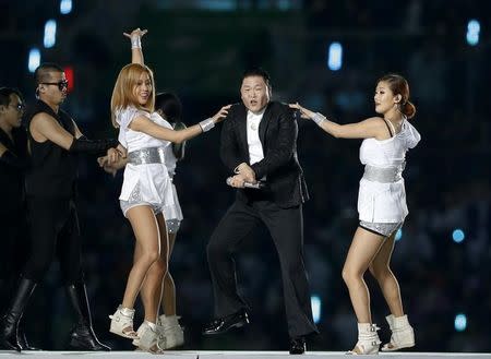 South Korean singer Psy performs during the opening ceremony of the 17th Asian Games in Incheon September 19, 2014. REUTERS/Tim Wimborne