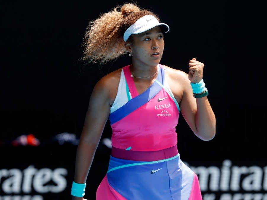 Naomi Osaka celebrates her victory (AFP via Getty Images)