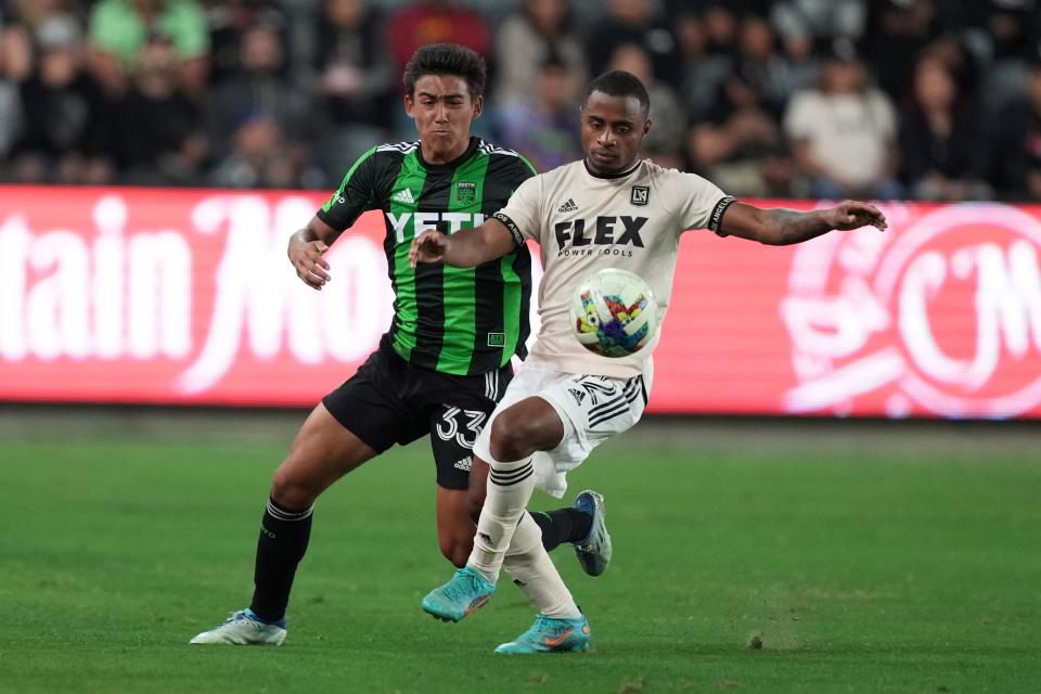 Los Angeles FC defender Diego Palacios, right, battles with Austin FC midfielder Owen Wolff during the teams' matchup in May. Austin defeated the league leaders 2-1 and meet again Friday at Q2 Stadium.