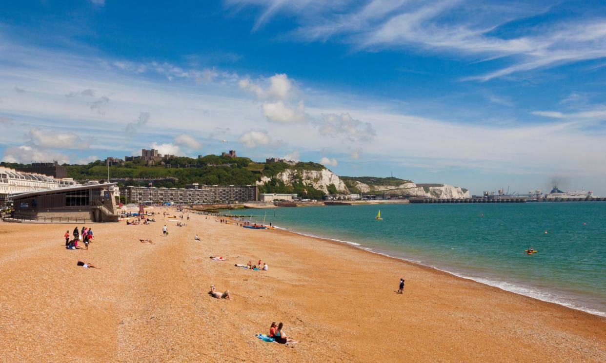 <span>Dover beach, with the castle, white cliffs and port in the background. The town is on the frontline of the small boats crisis, says Labour leader Keir Starmer.</span><span>Photograph: MS Bretherton/Alamy</span>