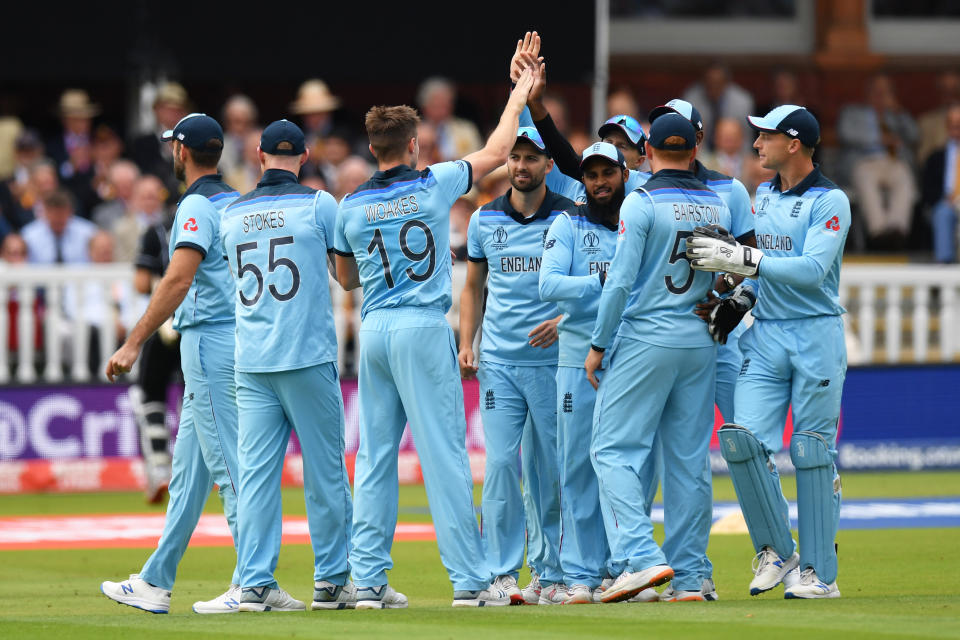 LONDON, ENGLAND - JULY 14: Chris Woakes of England celebrates with his teammates after dismissing Martin Guptill of New Zealand during the Final of the ICC Cricket World Cup 2019 between New Zealand and England at Lord's Cricket Ground on July 14, 2019 in London, England. (Photo by Mike Hewitt/Getty Images)