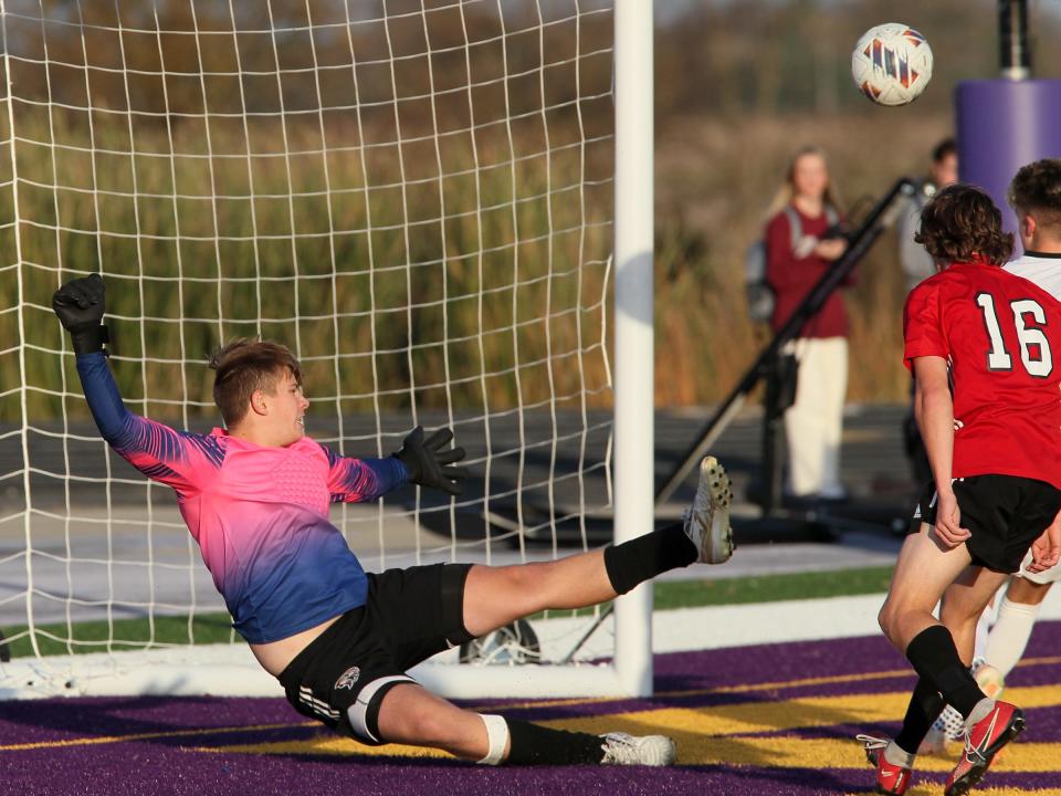 Fairfield Union's D.J. Spicer deflects a shot off his foot during Watterson's 4-0 victory in a Division II regional final Saturday at Bloom-Carroll.