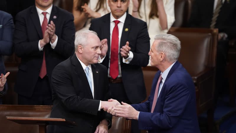 Rep. Steve Scalise, R-La., shakes hands with Rep. Kevin McCarthy, R-Calif., after nominating him for the third round of votes for Speaker of the House at the U.S. Capitol on Jan. 3, 2023, in Washington.