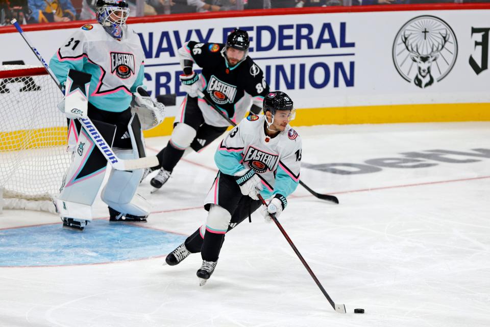 Blue Jackets forward Johnny Gaudreau controls the puck during the NHL All-Star Game.