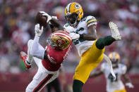 Green Bay Packers free safety Darnell Savage, right, defends a pass intended for San Francisco 49ers wide receiver Deebo Samuel during the first half of an NFL football game in Santa Clara, Calif., Sunday, Sept. 26, 2021. (AP Photo/Tony Avelar)