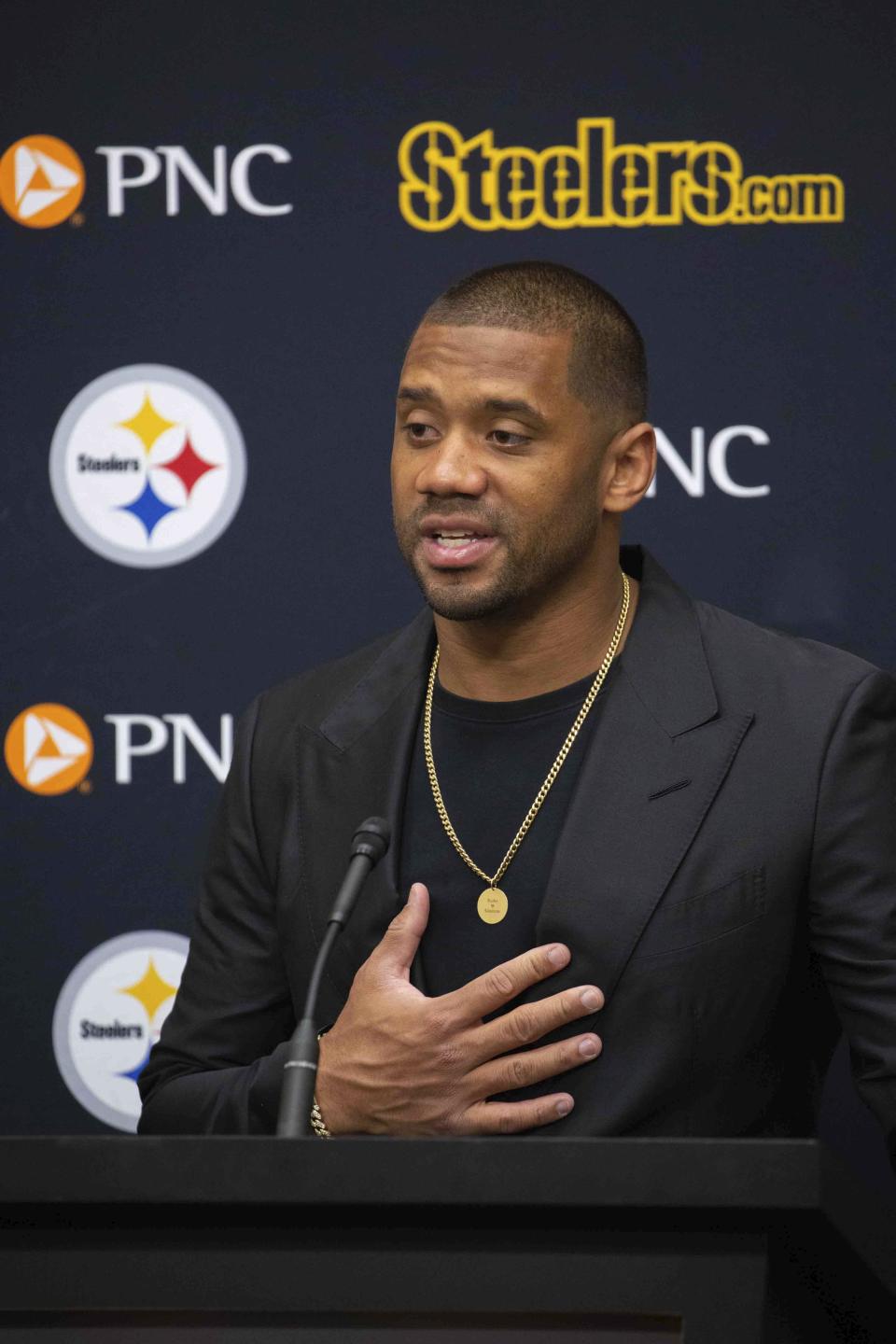 Pittsburgh Steelers newly signed quarterback Russell Wilson speaks with reporters during an NFL football press conference in Pittsburgh, Friday, March 15, 2024. (AP Photo/Rebecca Droke)