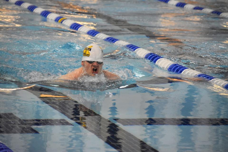 Mooresville's Dylan Rogers competes in the 100-yard breaststroke during sectional preliminaries at Franklin Community High School on Feb. 17, 2022.