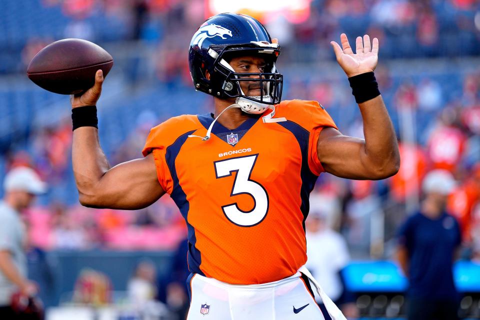 Denver Broncos quarterback Russell Wilson (3) warms up prior to an NFL preseason football game against the Minnesota Vikings, Saturday, Aug. 27, 2022, in Denver. (AP Photo/Jack Dempsey)