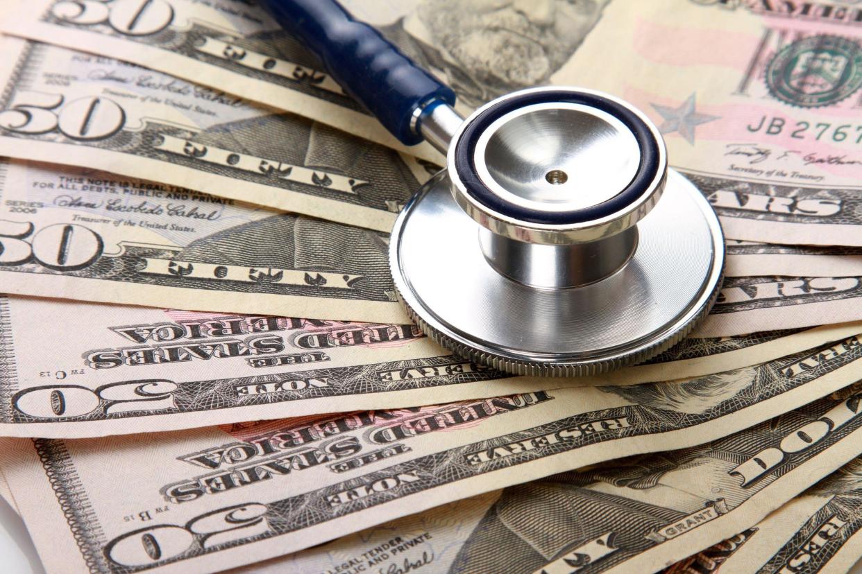 stethoscope on money background