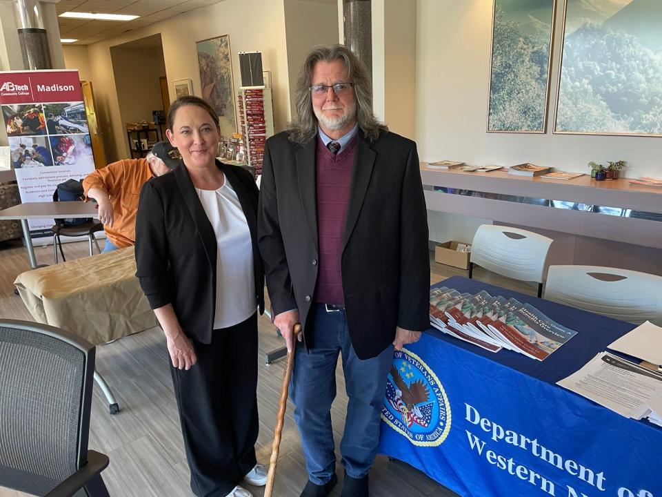 Tanya Santos, public information officer with the Winston-Salem VA Regional Office, and Vance James, Western North Carolina VA Healthcare System public affairs officer, both of whom are veterans, pose at the veterans health benefits fair in Marshall April 6.