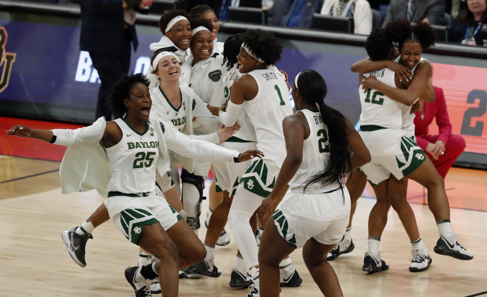 Baylor players celebrate their 72-67 win over Oregon during a Final Four semifinal of the NCAA women’s college basketball tournament Friday, April 5, 2019, in Tampa, Fla. (AP Photo/Mark LoMoglio)