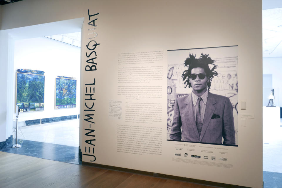 Entrance to an exhibit by artist Jean-Michel Basquiat is seen at the Orlando Museum of Art, Wednesday, June 1, 2022, in Orlando, Fla. On Friday, June 24, 2022, the FBI raided the art museum and seized more than two dozen paintings attributed to Basquiat following questions about their authenticity. (AP Photo/John Raoux)