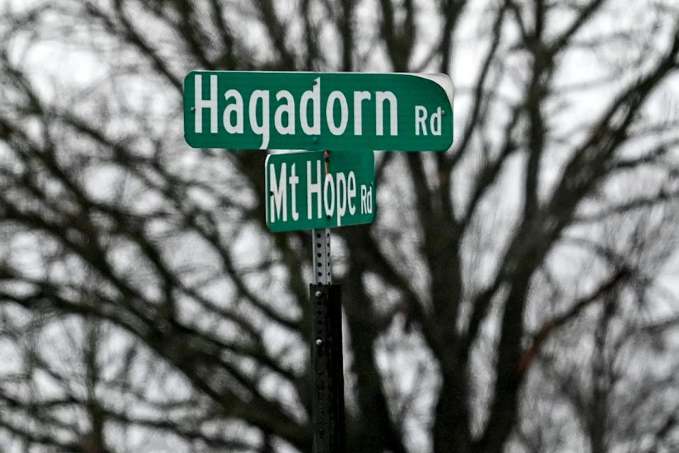 The street sign at Mount Hope and Hagadorn roads on Friday, Jan. 26, 2024, in Meridian Township.