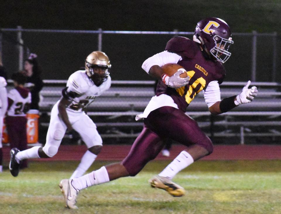 Case's Devin Silva takes the ball downfield to complete a 73-yard touchdown run in the second quarter.