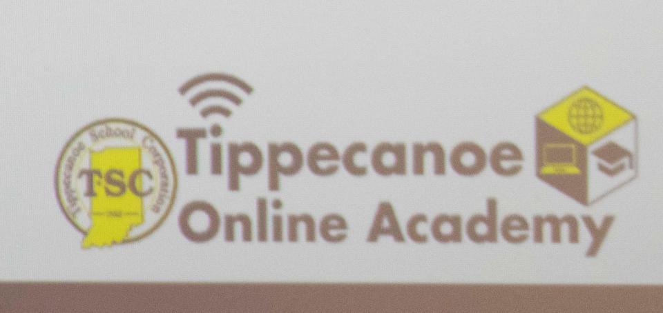 The logo for the Tippecanoe Online Academy is projected onto a screen during a Tippecanoe School Corporation Board of Trustees meeting, Wednesday, Sept. 13, 2023, at the TSC Administration Building in Lafayette, Ind.