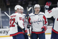 Washington Capitals' Daniel Sprong celebrates with teammates after scoring a goal during the third period of an NHL hockey game against the New York Islanders Saturday, April 24, 2021, in Uniondale, N.Y. The Capitals won 6-3. (AP Photo/Frank Franklin II)