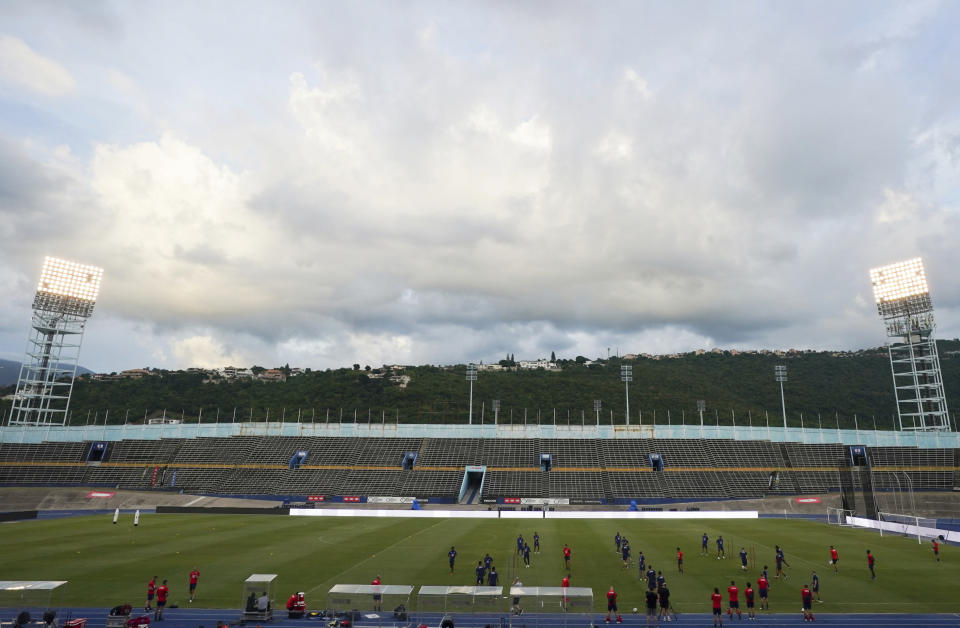 United States' players warm up during a training session ahead of the World Cup 2022 qualifying soccer match against Jamaica in Kingston, Monday, Nov. 15, 2021.(AP Photo/Fernando Llano)