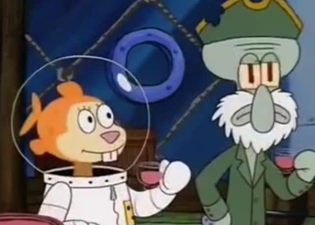 Sandy Cheeks has her head designed like a goldfish inside her helmet.