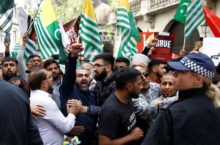 Demonstrators protest the scrapping of the special constitutional status in Kashmir by the Indian government, outside the Indian High Commission in London