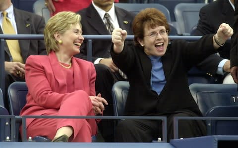 Hillary Clinton watches Billie Jean King watch the match of Serena Williams of the US and Anca Barna of Germany during their first round matches at the 2001 US Open - Credit: AFP