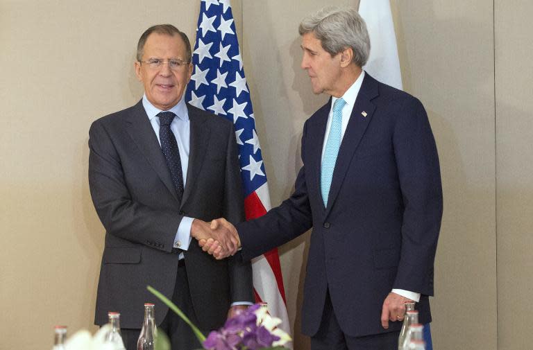 US Secretary of State John Kerry (right) shakes hand with Russian Foreign Minister Sergey Lavrov prior to a meeting in Geneva, on March 2, 2015